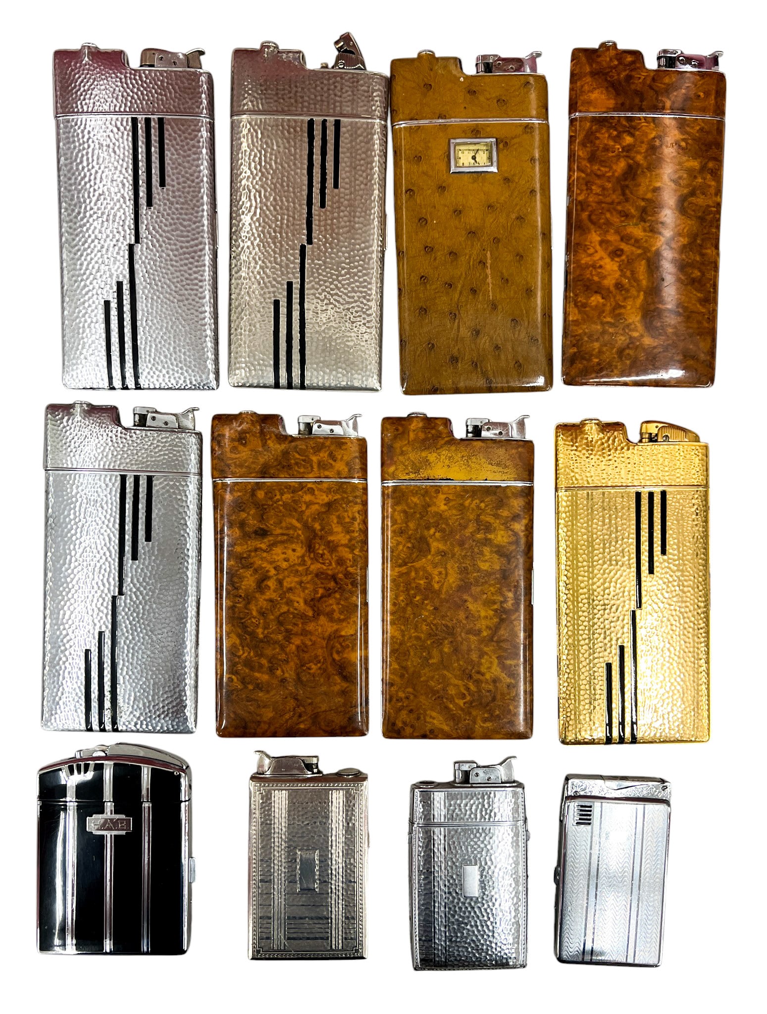 14pc Vintage Case Lighters: 14pc Vintage Case Lighters 7"x3" Largest. Brands include Pollak, Evans, Ronson etc.
