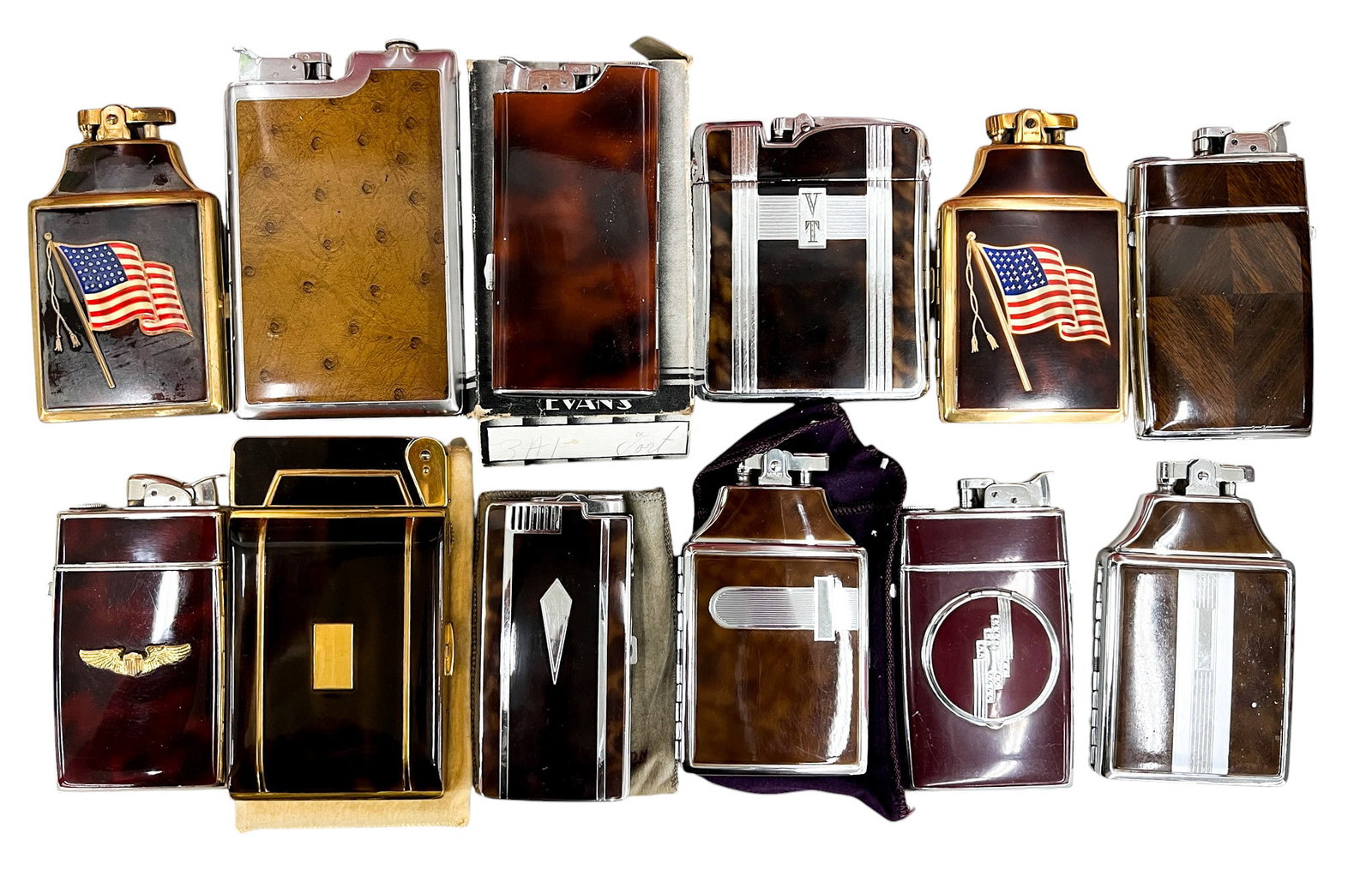 12pc Vintage Case Lighters: 12pc Vintage Case Lighters 5"x3" Largest. Brands include Metalfield, Ronson, Evans etc.