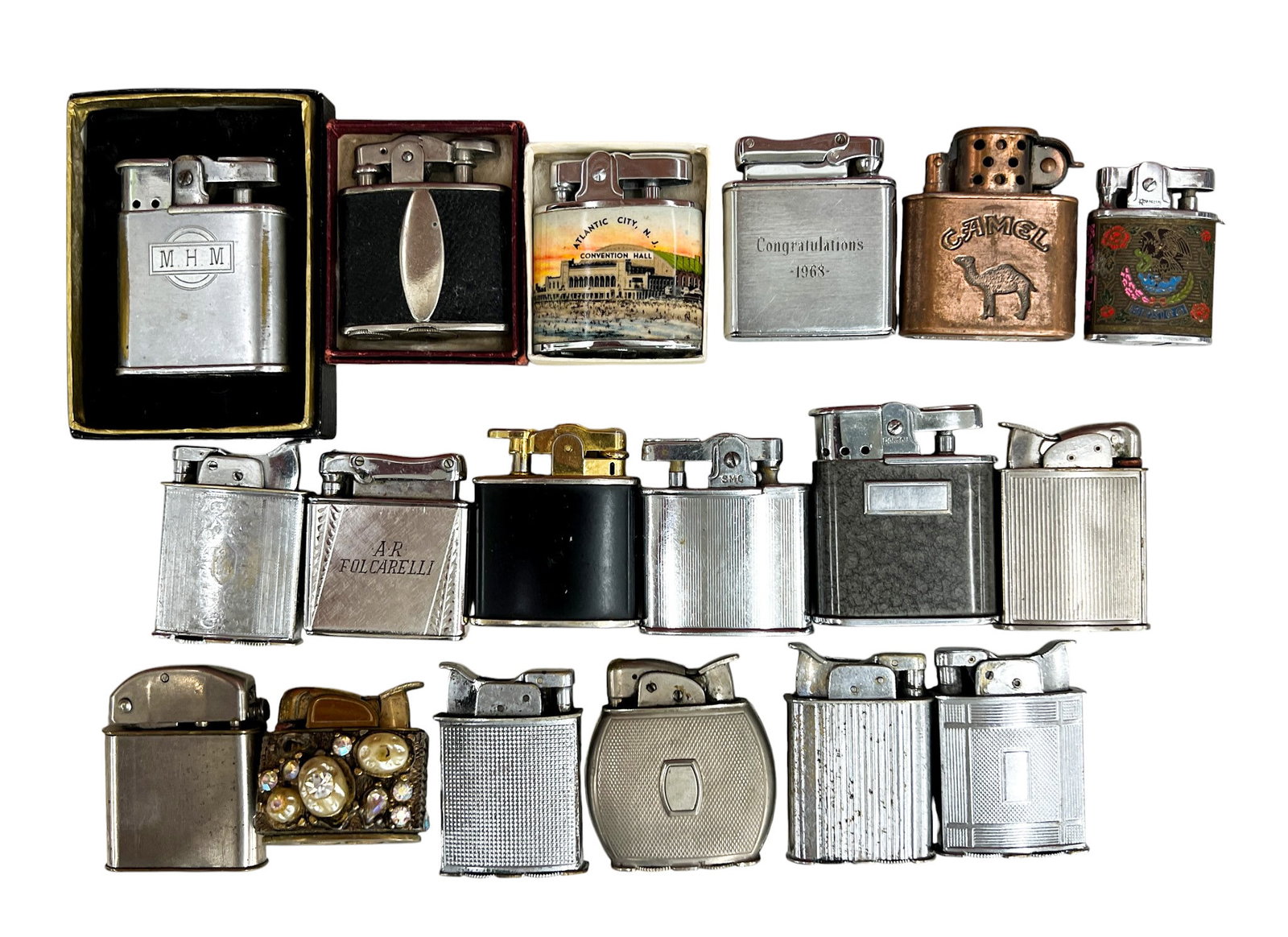 18pc Vintage Lighters: 18pc Vintage Lighters 2.25"x2" Largest. Brands include Ronson, PAC, Kreisler, Evans, Supreme etc.