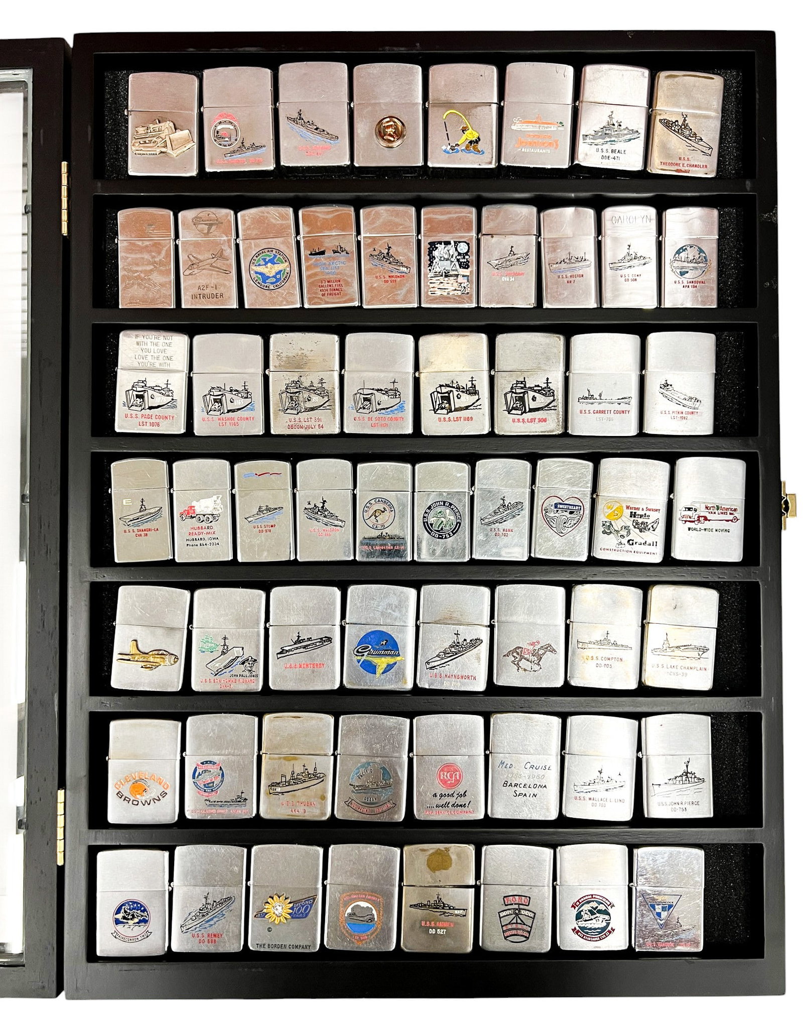 61pc Vintage Zippo Lighters w Display Case: 61pc Vintage Zippo Lighters w Display Case 19.5"x14.5" Case. Includes space, Cleveland Browns, Air Force lighters.