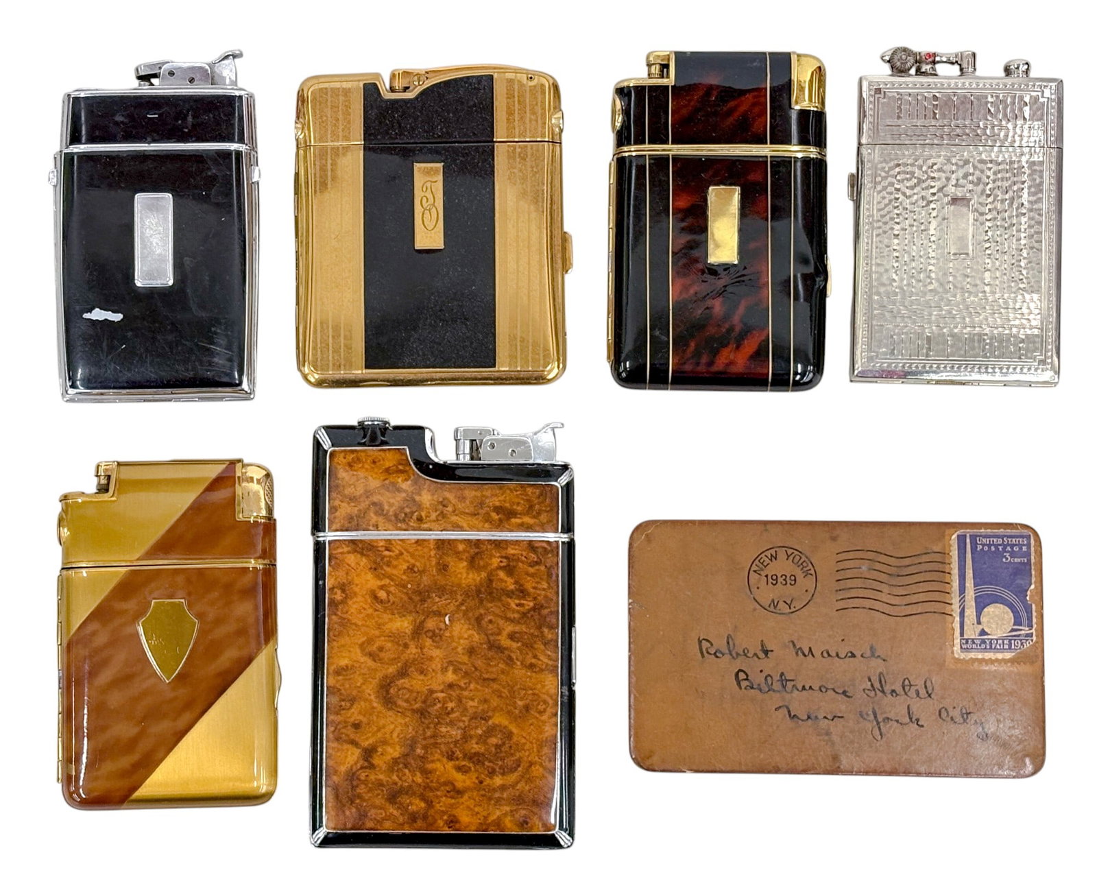 7pc Vintage Case Lighters & Case: 7pc Vintage Case Lighters & Case 5.25"x3.25" Largest. Some include boxes. Brands include Evans, Marathon, Ronson etc.