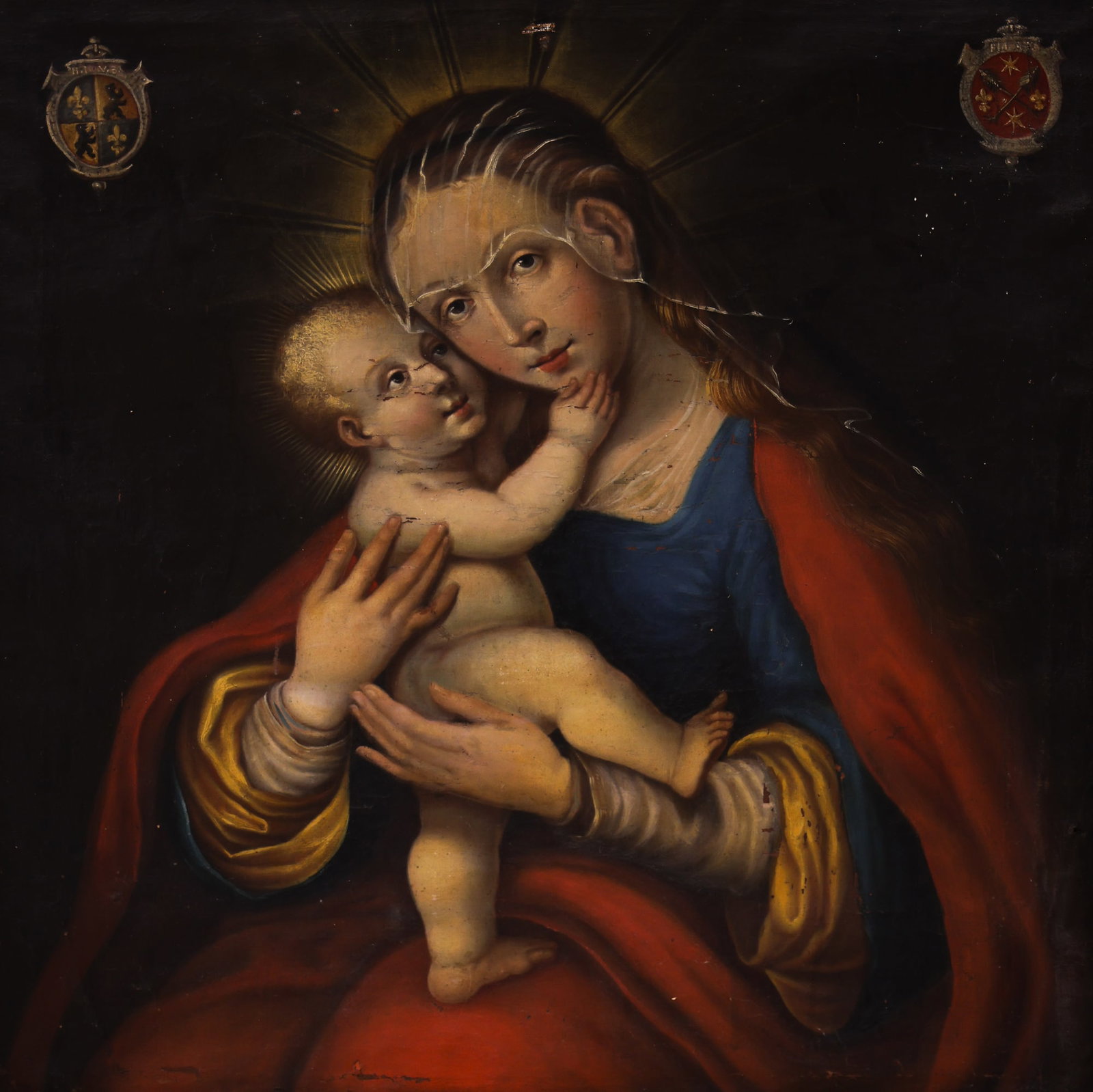 Cusco School 18th Cent. Madonna and Child Oil on Canvas: Cusco School 18th Cent. Madonna and Child Oil on Canvas 26"x23.5" Image. Spanish colonial religious scene with two crests at corners. Vintage framing 29"x26". Some scattered minor paint flaking and ca