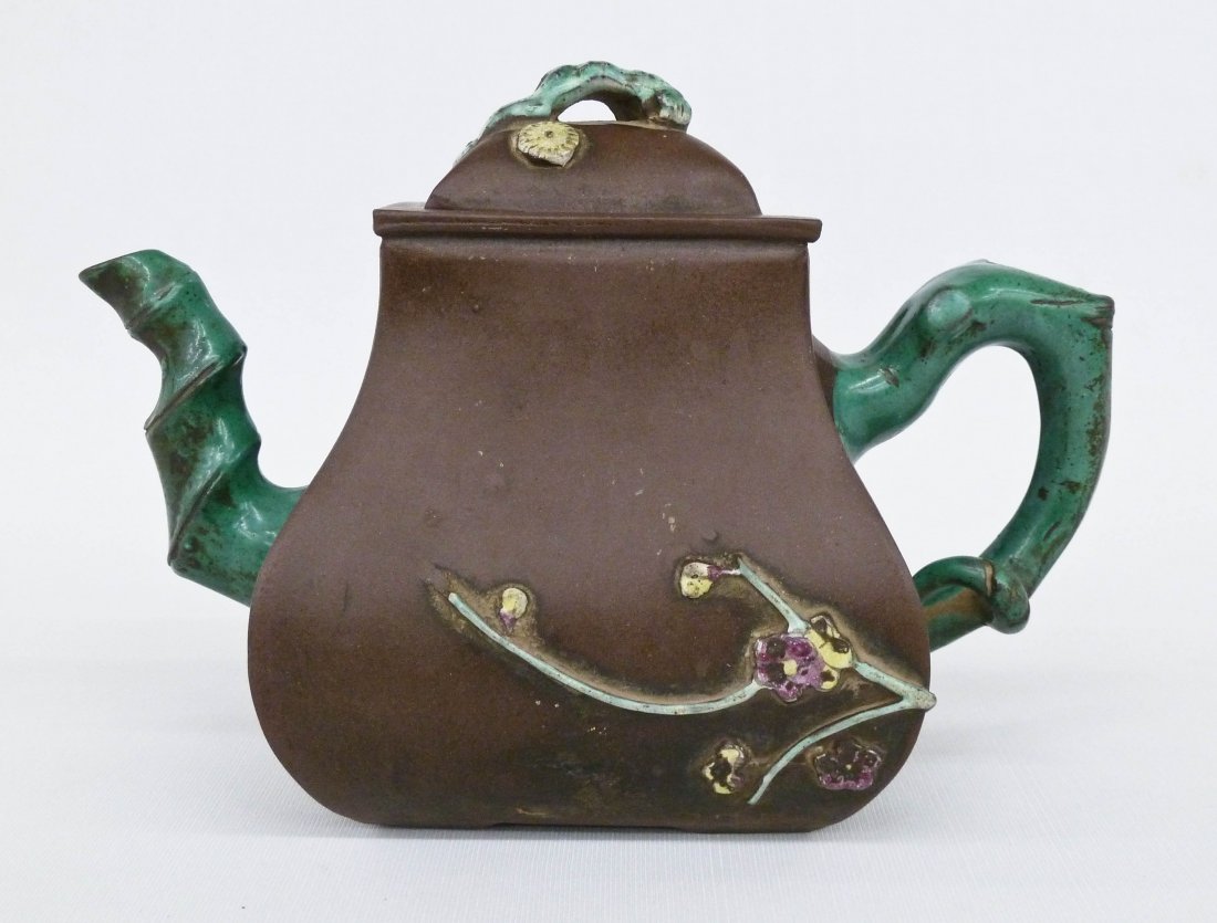 Antique Chinese Green Zisha Enamel Yixing Clay Teapot: Antique Chinese Green Zisha Enamel Yixing Clay Teapot 5.25''x7.5''. Naturalistic bamboo handle and spout. Impressed four character seal on bottom with wax export seal inside lid. Large chip to bottom 
