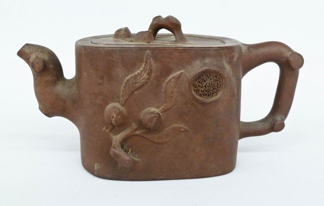 Antique Chinese Yixing Crabstcok & Peach Clay Teapot: Antique Chinese Yixing Crabstcok & Peach Clay Teapot 4''x7''. Four character impressed seal mark on bottom. Chipping to lid edges.