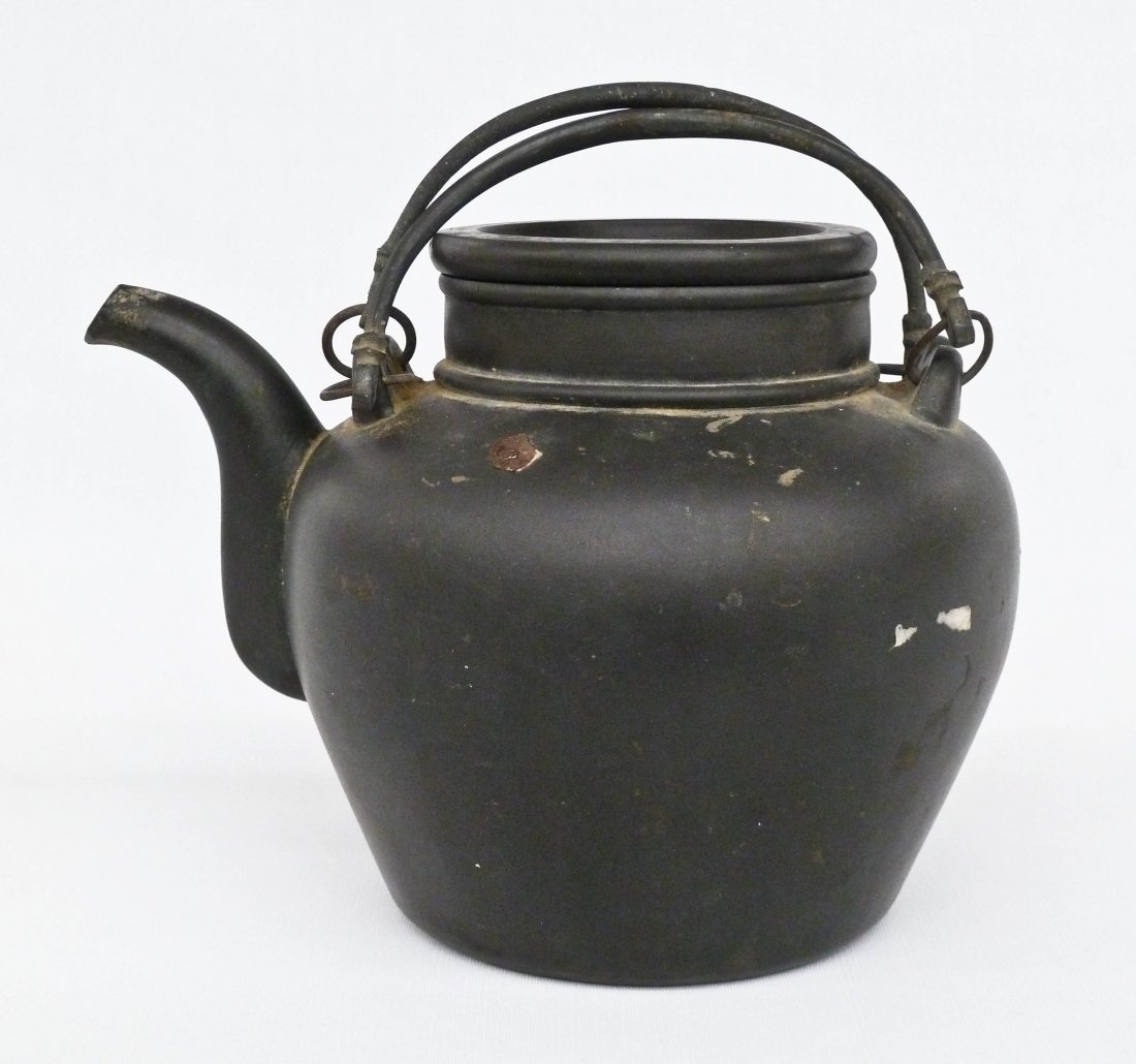 Antique Chinese Black Large Yixing Clay Teapot: Antique Chinese Black Large Yixing Clay Teapot 7.25''x9.5''. Original lead handles. Double gourd mark impressed on top of lid and stylized impressed chop mark on bottom. Wax export seal on side should