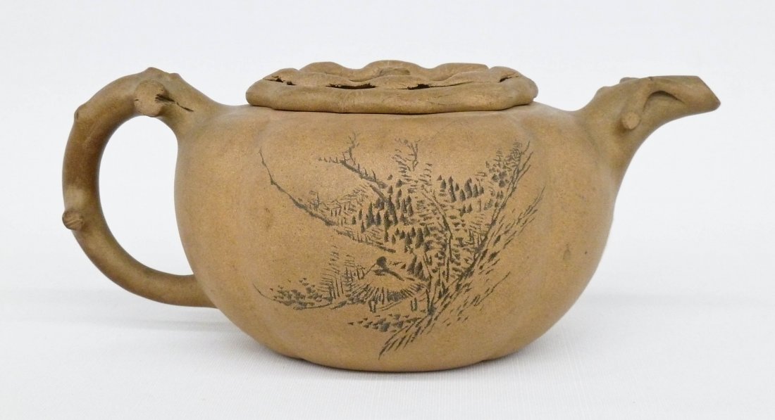 Chinese Buff Colored Yixing Clay Teapot with Carved: Chinese Buff Colored Yixing Clay Teapot with Carved Decoration & Inscription 4''x8.75''. Wax export seal and museum markings on bottom. No damage.
