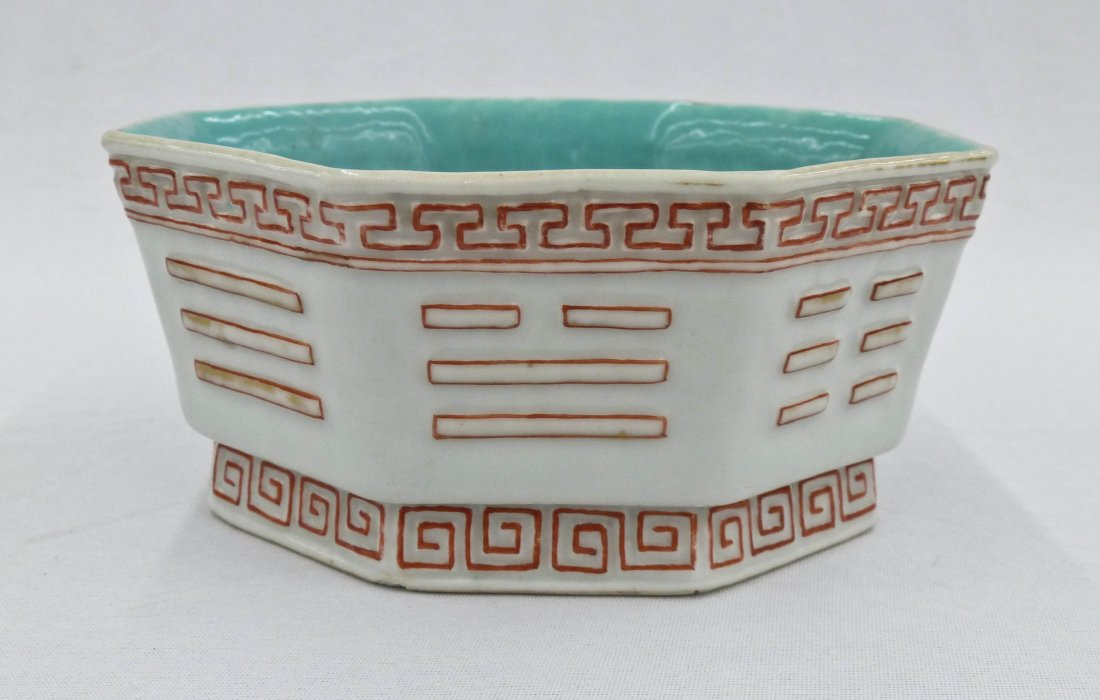 Antique Chinese Daoguang Famille Rose Buddhist Trigram: Antique Chinese Daoguang Famille Rose Buddhist Trigram Porcelain Bowl 2.5''x5.75''. Wear to inside of bowl and very small chip to base. Bears a red enameled Daoguang seal mark on bottom.