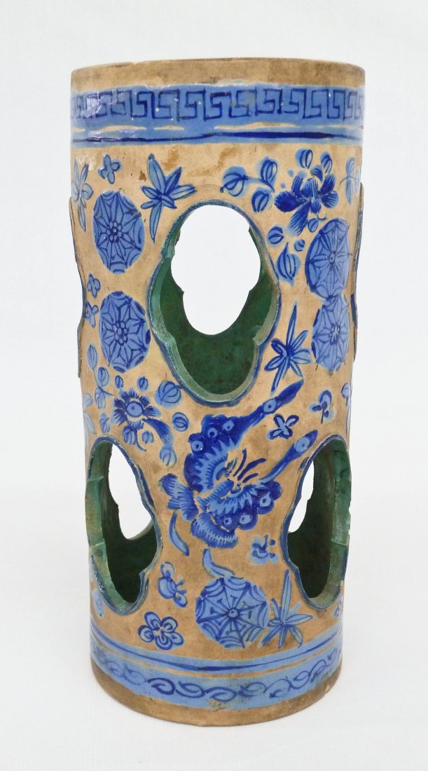 Antique Chinese Yixing Blue Zisha Enamel Pottery Hat: Antique Chinese Yixing Blue Zisha Enamel Pottery Hat Stand 9.25''x4.25''. Depicts ornaments, flowers, and butterflies around exterior. Has a two character Chinese mark written on bottom. Slight chippi