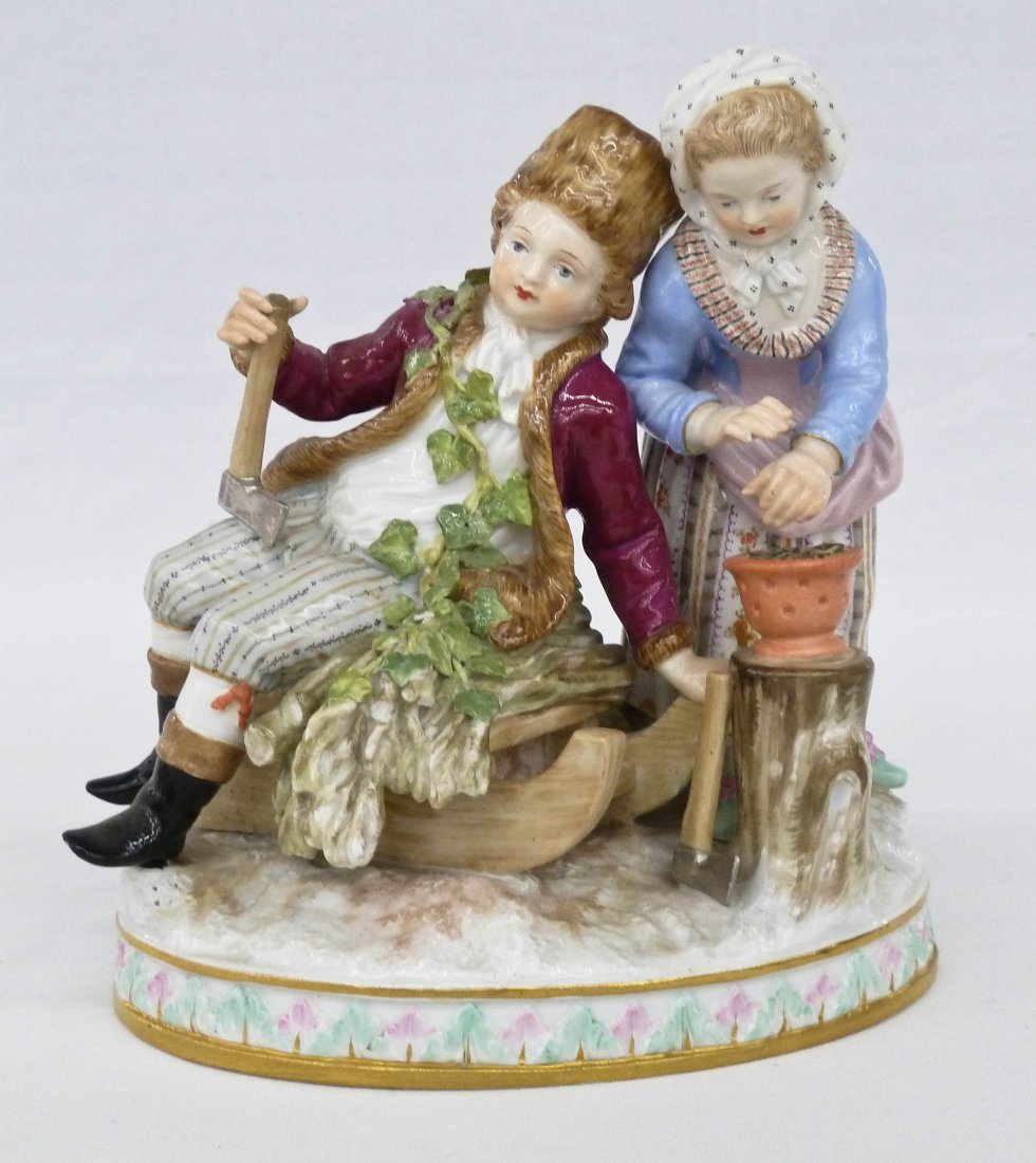 Meissen ''Winter'' Fine Porcelain Figure Group: Meissen ''Winter'' Fine Porcelain Figure Group 5.5''x5.25''x3.5''. Depicts two children, boy and girl sitting on a sled. Chip to log on back of figure. 19th century.