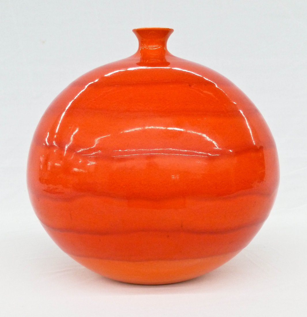 James Lovera (b.1920 California) Orange Glaze Bottle: James Lovera (b.1920 California) Orange Glaze Bottle Form Studio Pottery Vase 9.25''x9''. Accompanied by original exhibition pamphlet from Association of San Francisco Potters 11th Exhibition, 1960. P