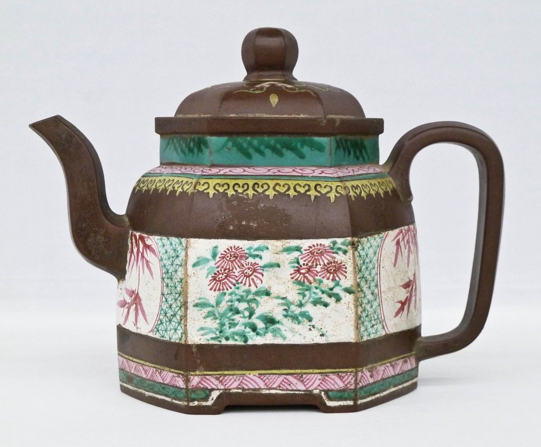 Antique Chinese Polygon Form Zisha Enamel Large Teapot: Antique Chinese Polygon Form Zisha Enamel Large Teapot 6.75''x9''. Six sided polychrome floral enameling in famille rose colors. Large six character impressed chop mark under base. Large chips and a c