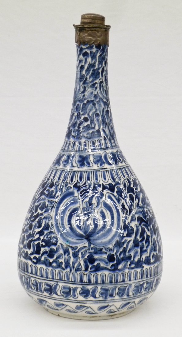 Antique Persian Islamic Blue & White Ceramic Pear Shape: Antique Persian Islamic Blue & White Ceramic Pear Shape Vase with Silver Mount 12.75''x6.5''. Vase has a three panel repeating blossoming flower design. Silver cover has been replace and there is 6''