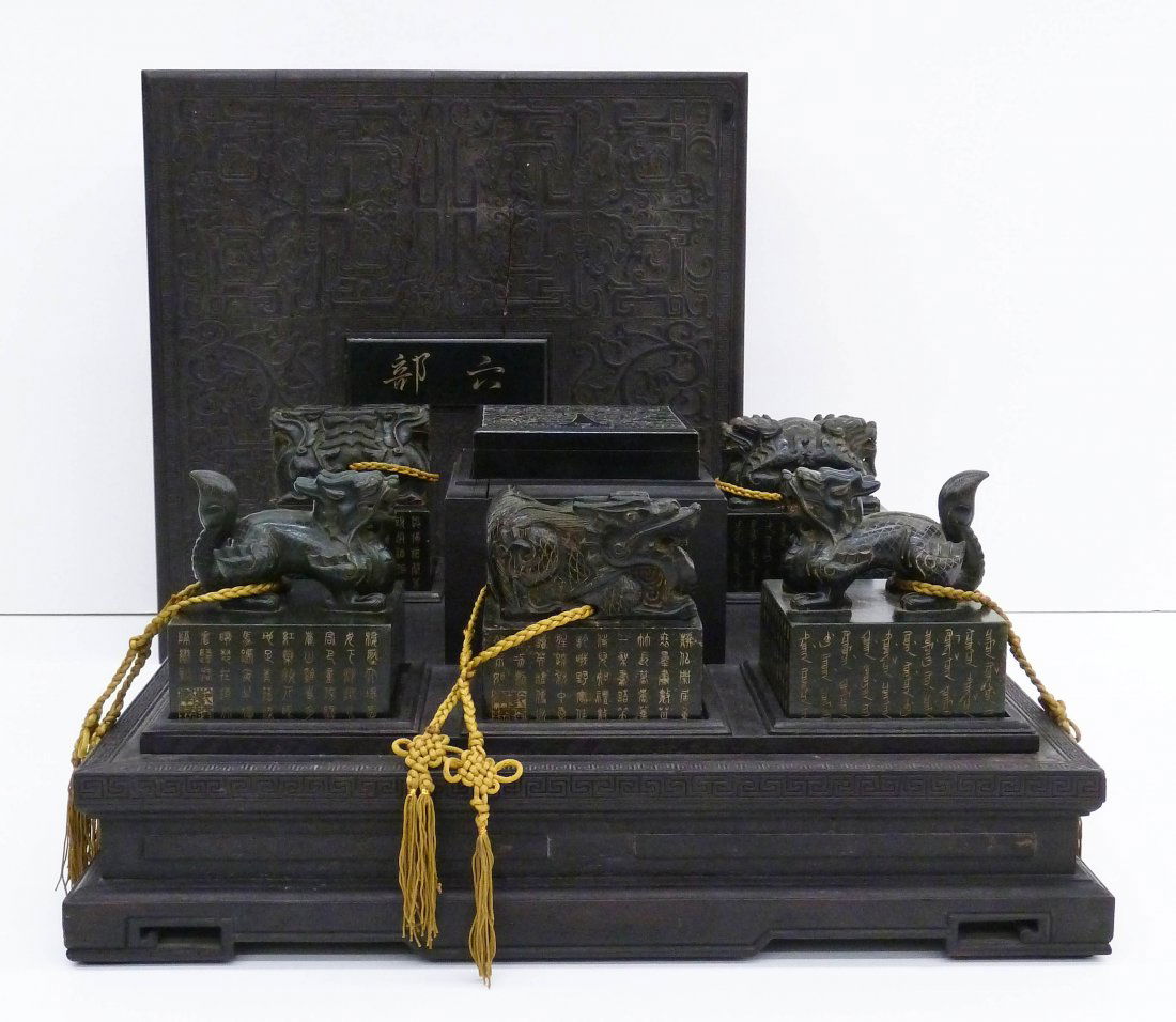 Chinese Jade Dragon Imperial Six Seals of State Set in: Chinese Jade Dragon Imperial Six Seals of State Set in Carved Zitan Wood Box. Set includes five large ornately carved jade seals, each measuring 4.5''x4.25''x4.25''. They depict seated foo lion dogs a