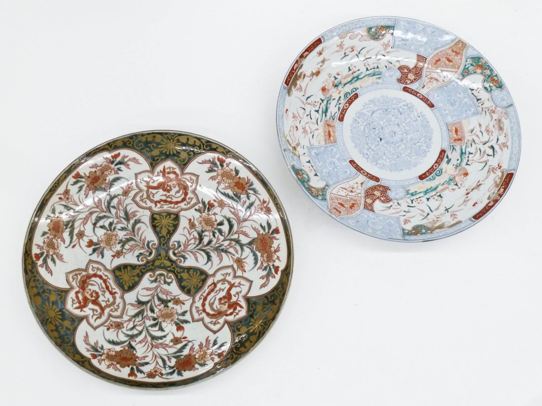 (2) Antique Japanese Porcelain Imari Chargers 18.5'': (2) Antique Japanese Porcelain Imari Chargers 18.5'' Diameter Each. Gilt phoenix charger with blue underglaze in excellent condition and softer colored polychrome enameled duck charger that is as-foun
