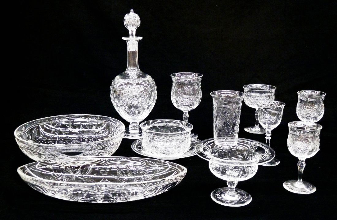 106 Pieces of Webb & Corbett Intaglio Cut Stemware.: 106 Pieces of Webb & Corbett Intaglio Cut Stemware. This large matching service includes a 13'' stoppered decanter, a celery bowl 11.25''x4.75'', a serving bowl 9'', (14) finger bowls with under trays