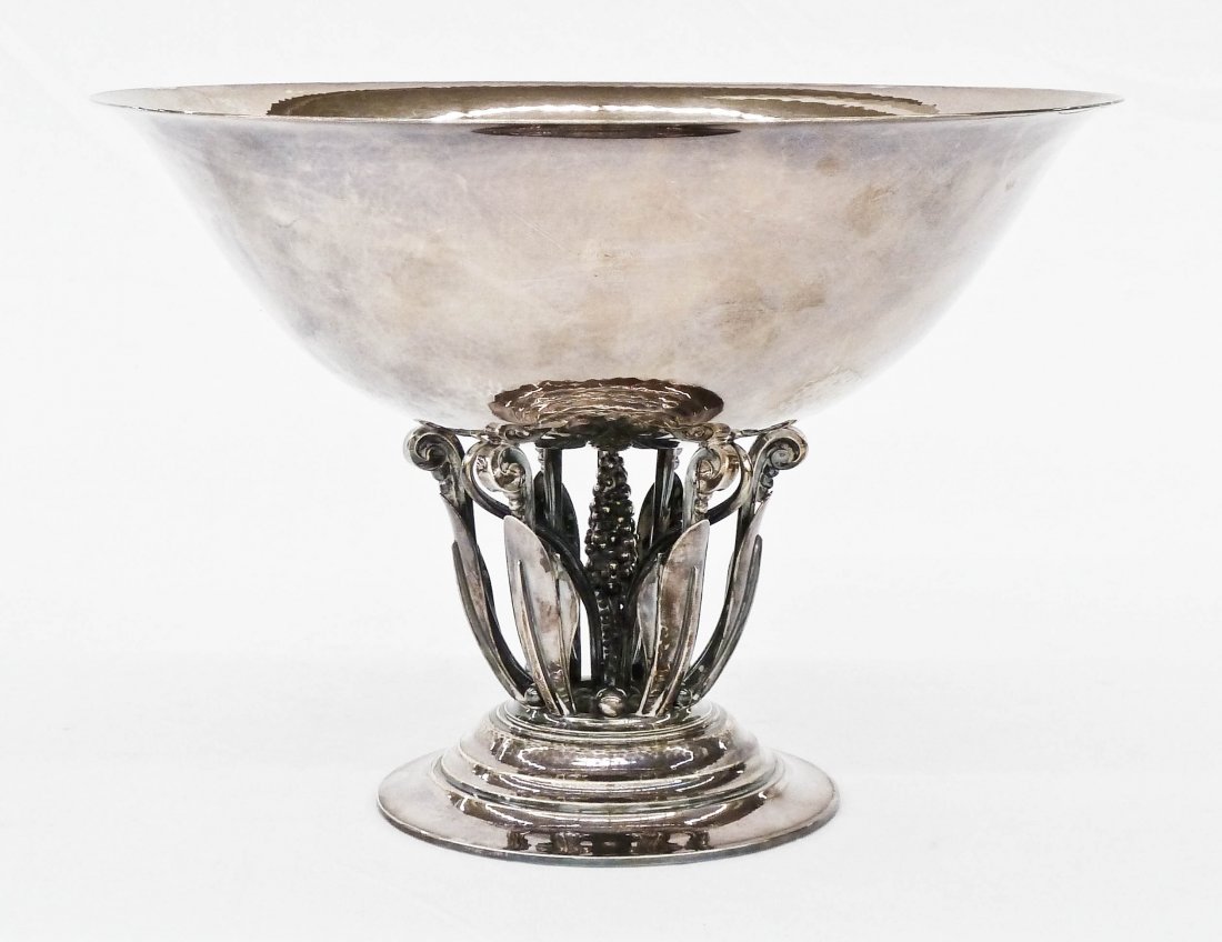 Georg Jensen Denmark Sterling Center Bowl by Johan Rohd: Johan Rohde Design for Georg Jensen Denmark Sterling Center Bowl Form 196. It measures 8''x11'' with a figural scrolling stem. It was made post 1945. It weighs 42.4 troy ounces. Excellent condition.
