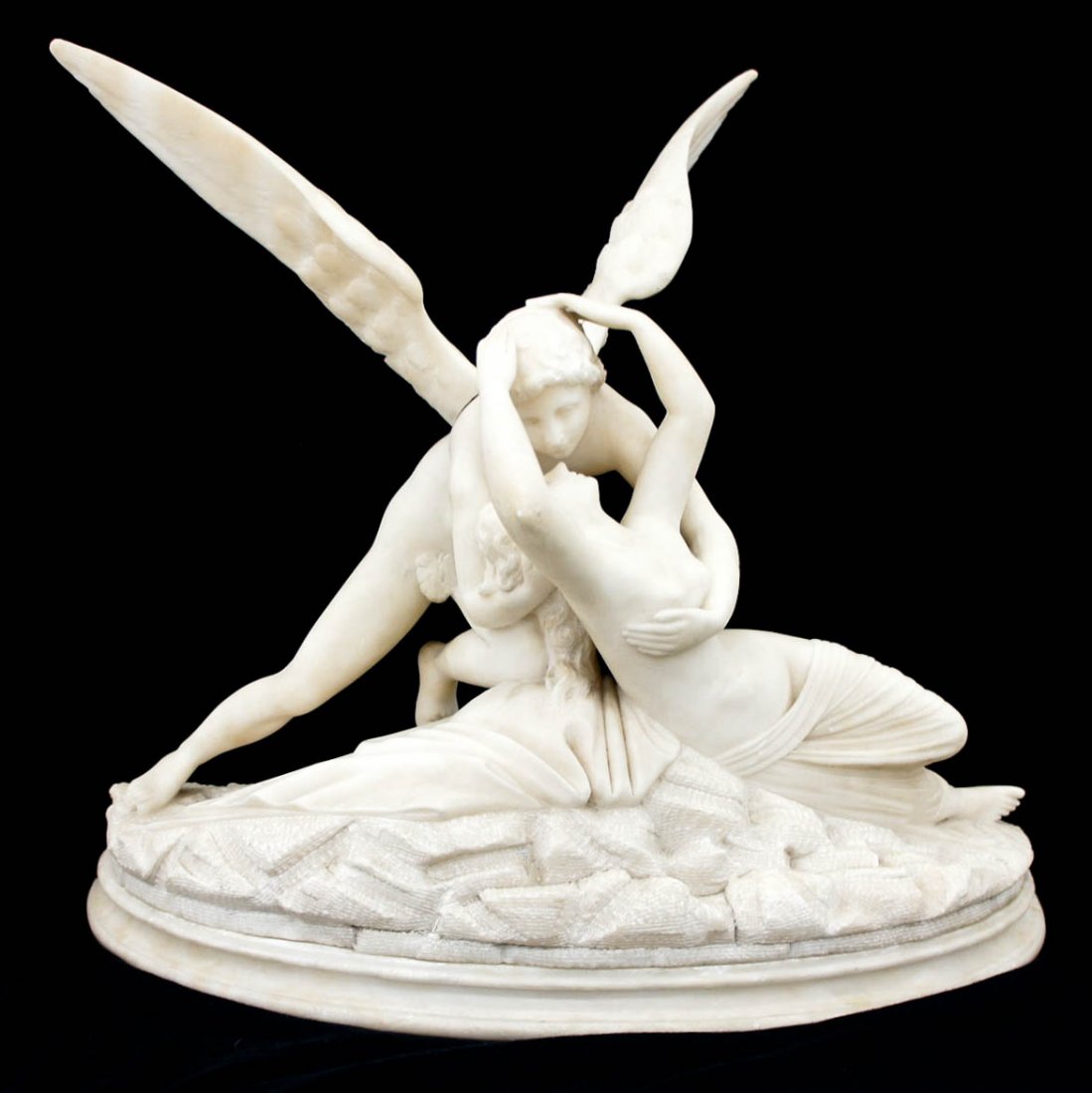 After Antonio Canova (1757-1822 Italian) ''Psyche: After Antonio Canova (1757-1822 Italian) ''Psyche Revived by Cupid's Kiss'' Carved White Marble Sculpture 20.75''x23''x11''. Some slight edge chipping. 20th century.