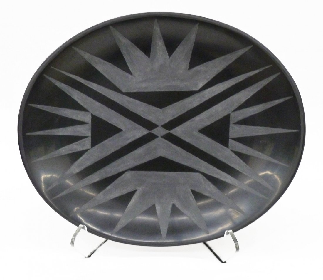 Marie & Julian Martinez San Ildefonso Blackware Platter: Marie & Julian Martinez San Ildefonso Blackware Platter 15''x12.5''. Pottery etched with a black geometric cloud design. Signed in script ''Marie + Julien''. Excellent condition. Maria.