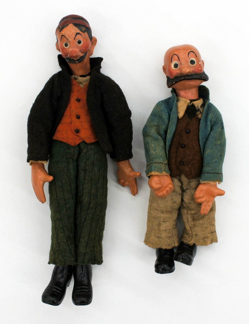Group 1920's Mutt & Jeff Character Jointed Metal &: Group 1920's Mutt & Jeff Character Jointed Metal & Composition Dolls by Bucherer Switzerland. Includes Mutt 8.25'', Jeff 6.5'', and The Key Master 7''. Excellent condition with original felt clothing.
