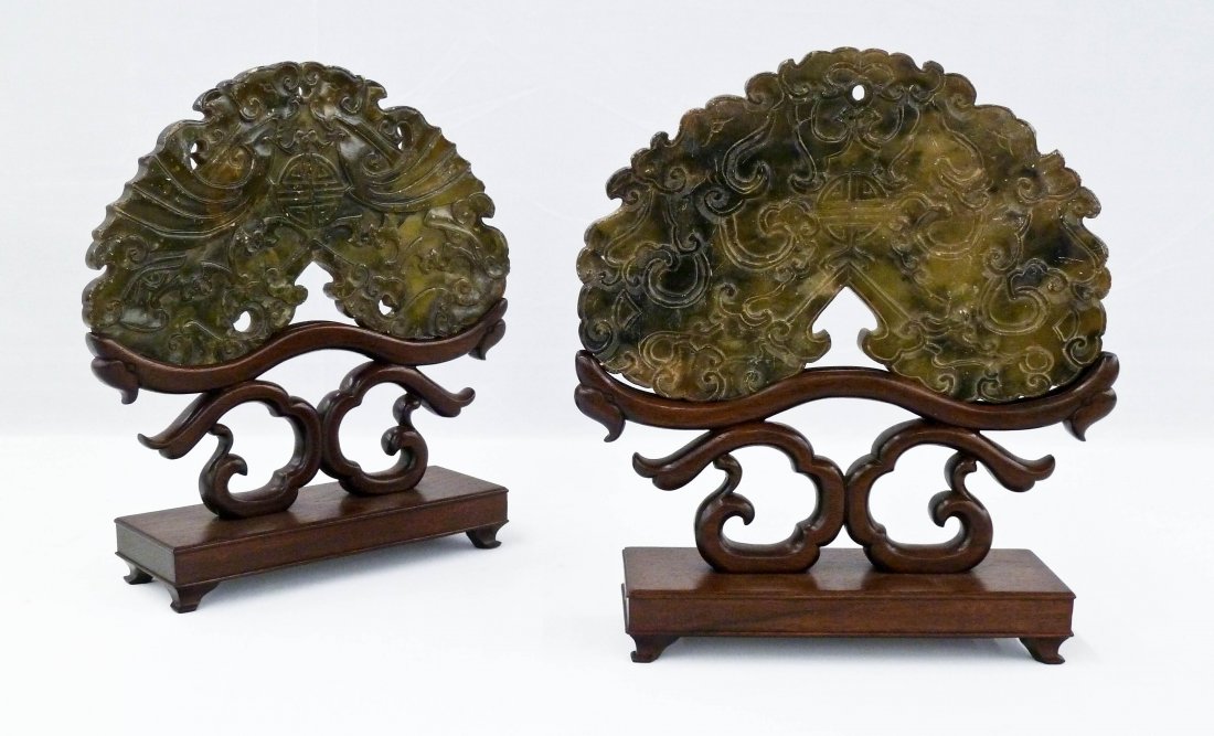 Pair Antique Chinese Green Soapstone Carved Bat Chimes: Pair Antique Chinese Green Soapstone Carved Bat Chimes on Stands 10.5''x9.75''. They are in the form of a bat or butterfly. Each is carved on both sides with bats around a central shou symbol. They ar