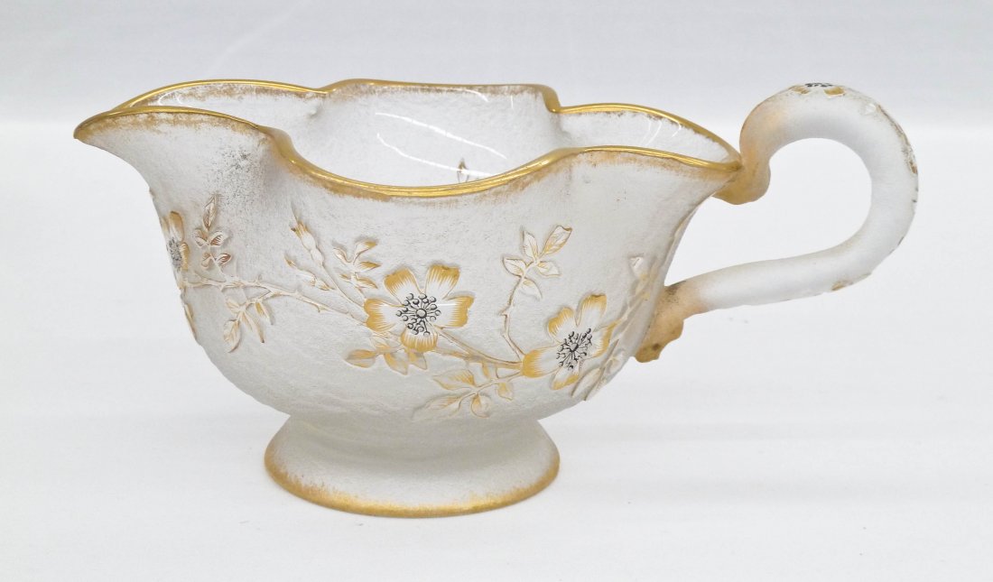 Daum Nancy Acid Cut Floral Art Glass Creamer: Daum Nancy Acid Cut Floral Art Glass Creamer 3.25''x7.5''. Gilt blossoming floral motifs on clear body. Gilt enameled signature on bottom.