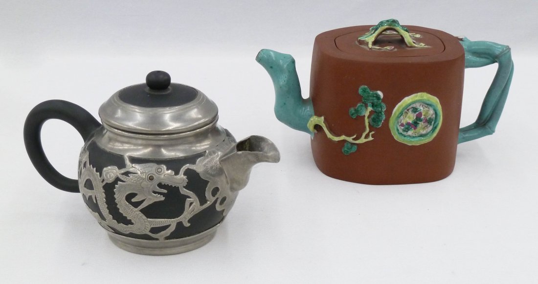 2pc Antique Chinese Yixing Clay Teapots. Includes zisha: 2pc Antique Chinese Yixing Clay Teapots. Includes zisha enameled crabstock 4.25''x8'' with impressed character mark under lid and pictoral mark on bottom. Also a black clay pewter mounted dragon teapo