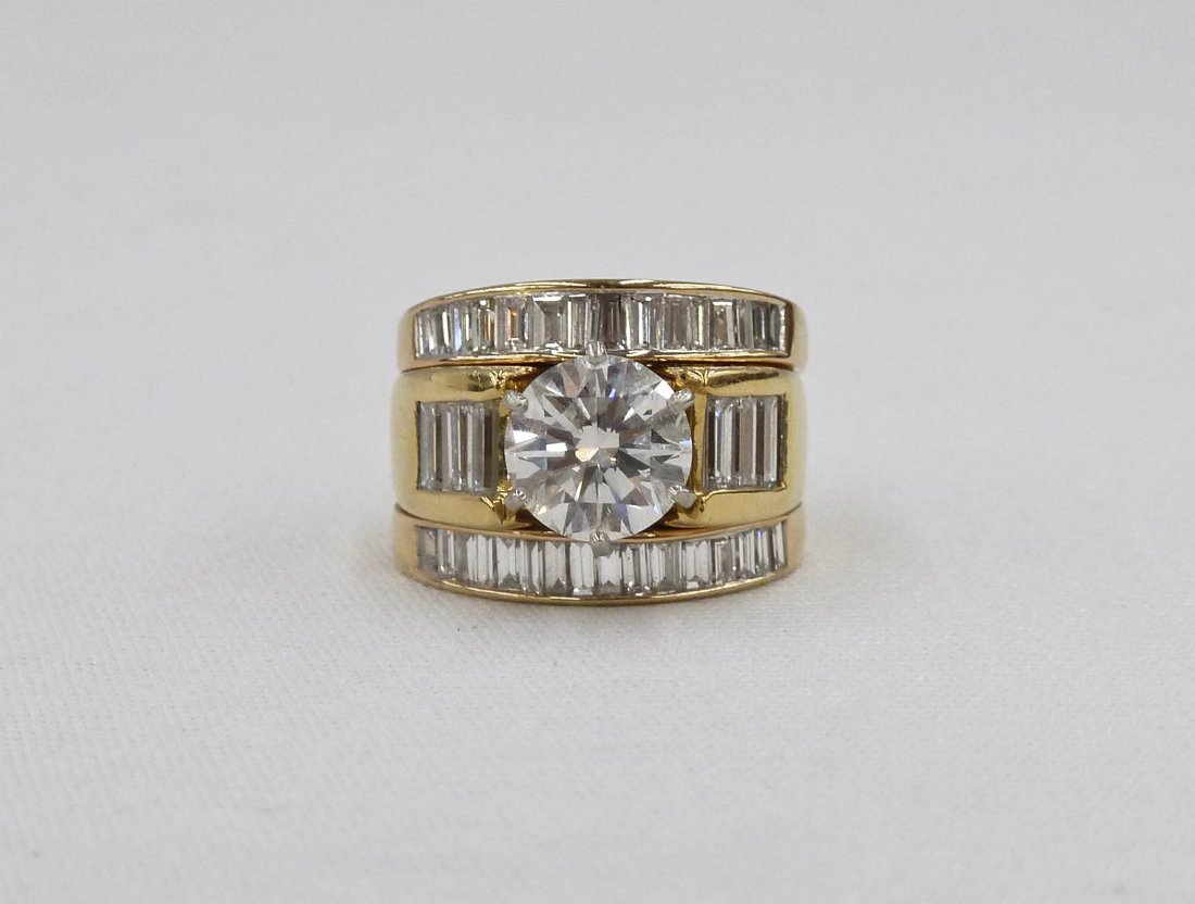 Lady's 3.34ct Diamond Ring Bridal Set in 18k/14k.: Lady's 3.34ct Diamond Ring Bridal Set in 18k/14k. Contains one round brilliant cut 2.24 carat center stone of SI-1 clarity, color J. Includes (37) baguette cut diamonds weighing an estimated total of