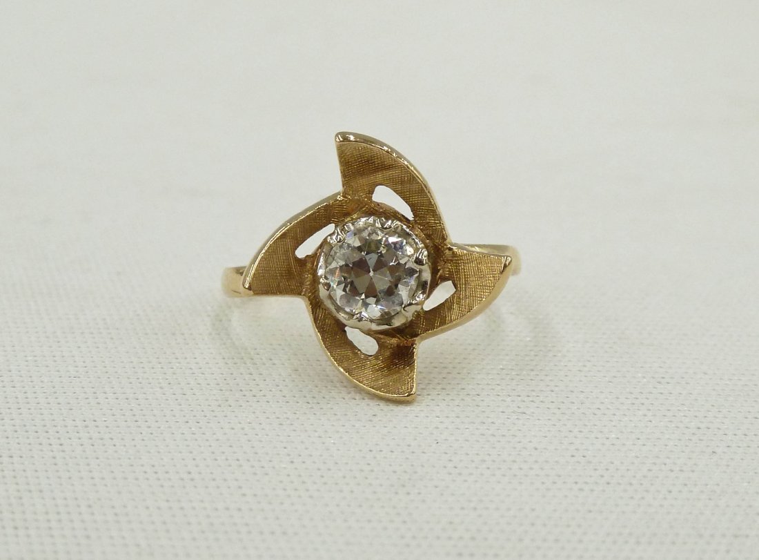 Lady's .51ct Diamond Solitaire Ring Set in 14k. Round: Lady's .51ct Diamond Solitaire Ring Set in 14k. Round brilliant cut diamond of SI-1 clarity, color J. It weighs 2.6 grams and comes with its original 18k white gold setting weighing 2.2 grams. Ring is