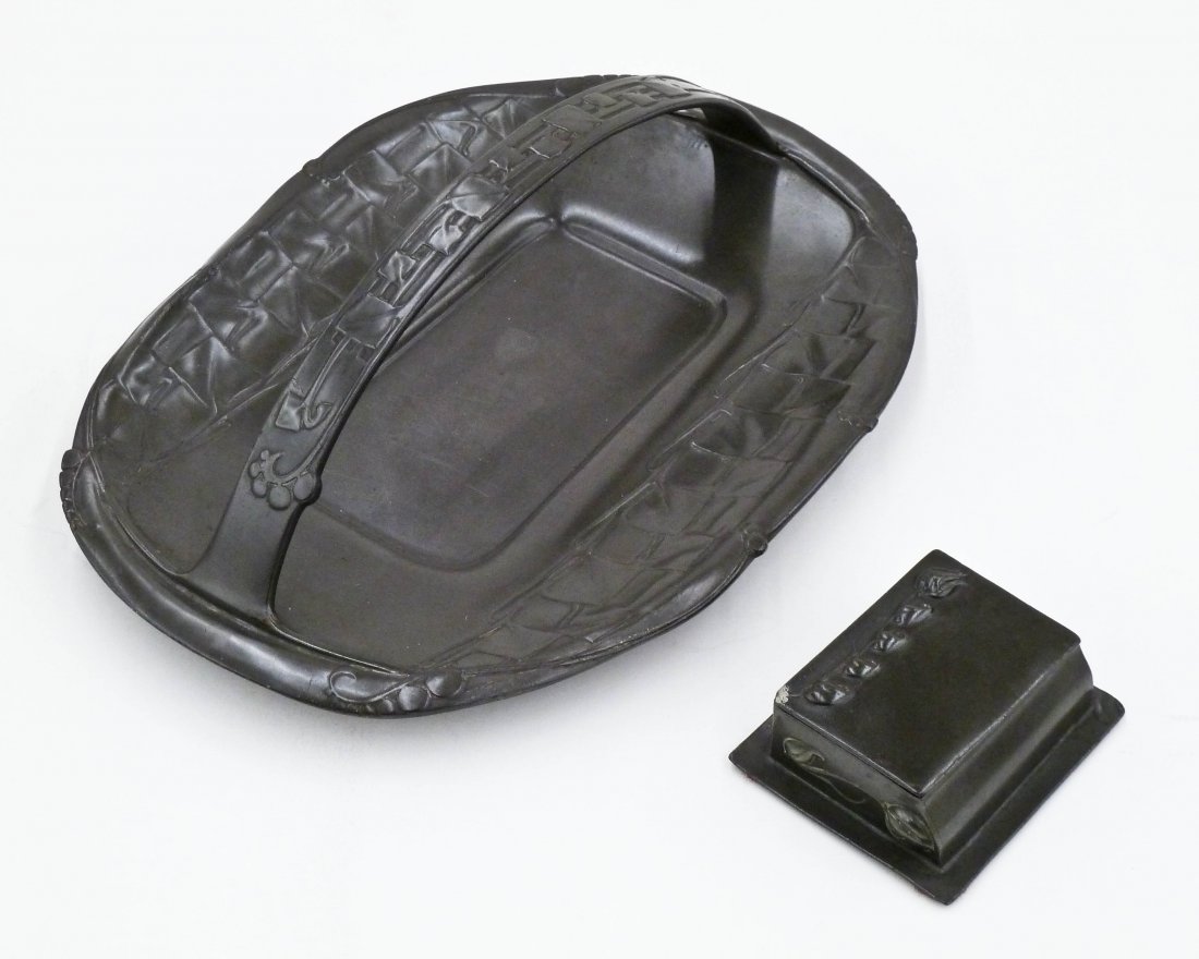 2pc Archibald Knox Tudric Pewter Handled Tray & Dresser: 2pc Archibald Knox Tudric Pewter Handled Tray & Dresser Box. Arts and crafts tray form 0357 measures 12''x8.5''. Dresser box form 013 is 3.5''x3'' and has dings to corners. Made by Liberty & Co.