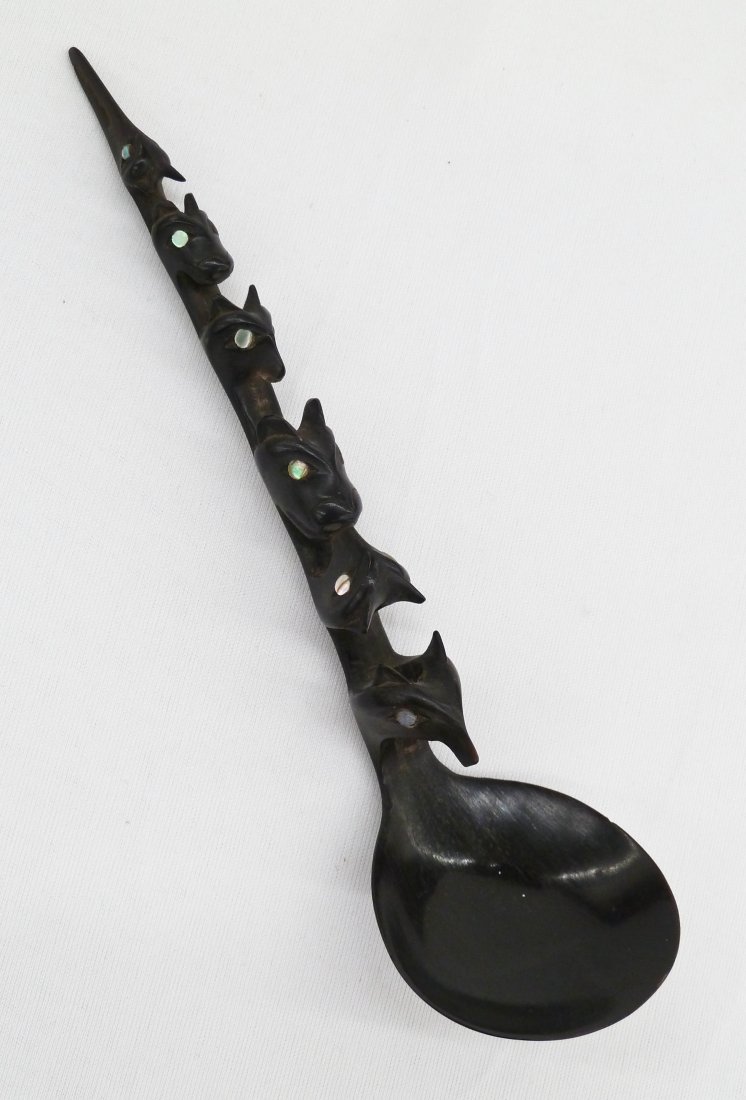 Antique Tlingit Carved Totemic Horn Spoon 7.25''x2''.: Antique Tlingit Carved Totemic Horn Spoon 7.25''x2''. Figural six animal effigy handle with mother of pearl inlaid eyes. Form the former collection of B. Loomis who traveled in Alaska between 1897-193