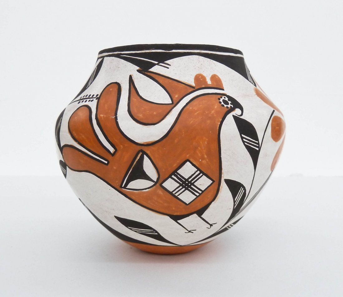 Lucy Lewis (1900-1992 Acoma) Polychrome Pottery Jar: Lucy Lewis (1900-1992 Acoma) Polychrome Pottery Jar 4.5''x5.25''. Depicts rain birds with stylized floral design. Excellent condition. Purchased from the artist at Allard Indian Show in San Francisco 