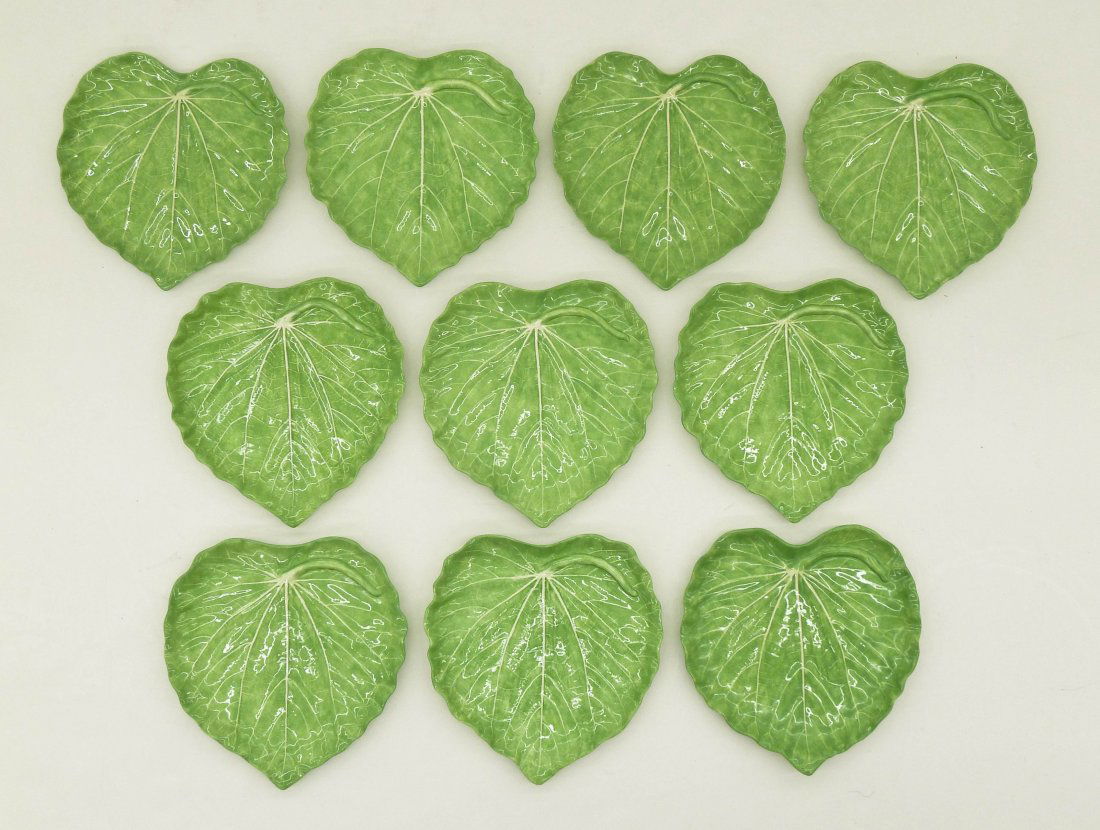 Dodie Thayer (20th Cent. Florida) Set of Ten Cabbage: Dodie Thayer (20th Cent. Florida) Set of Ten Cabbage Leaf Ceramic Plates 8.75''x8.25'' Each. Impressed and script signatures. Two of them have a slight glaze chip to edge. No other damage.