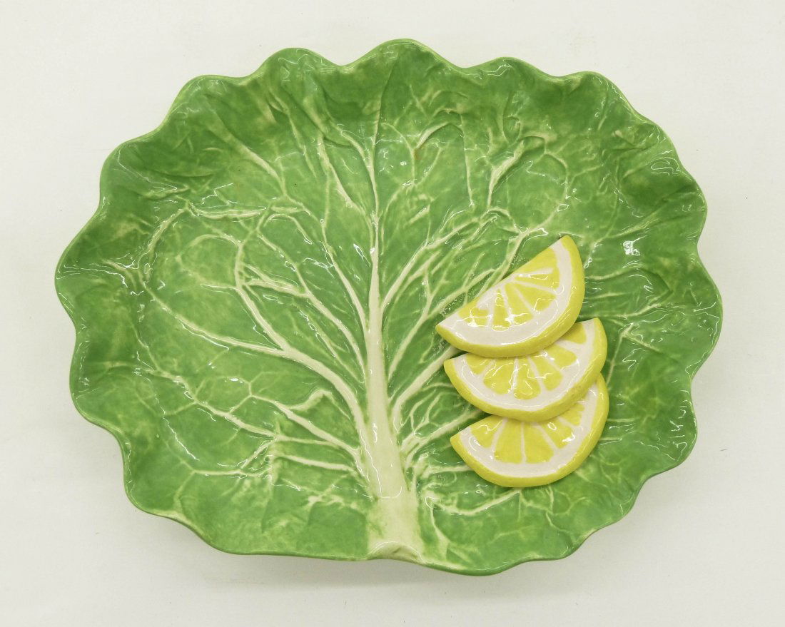Dodie Thayer (20th Cent. Florida) Cabbage Tray with: Dodie Thayer (20th Cent. Florida) Cabbage Tray with Lemons Ceramic 5.5''x7''. Figural applied lemons. Impressed monogram signature. Excellent condition.