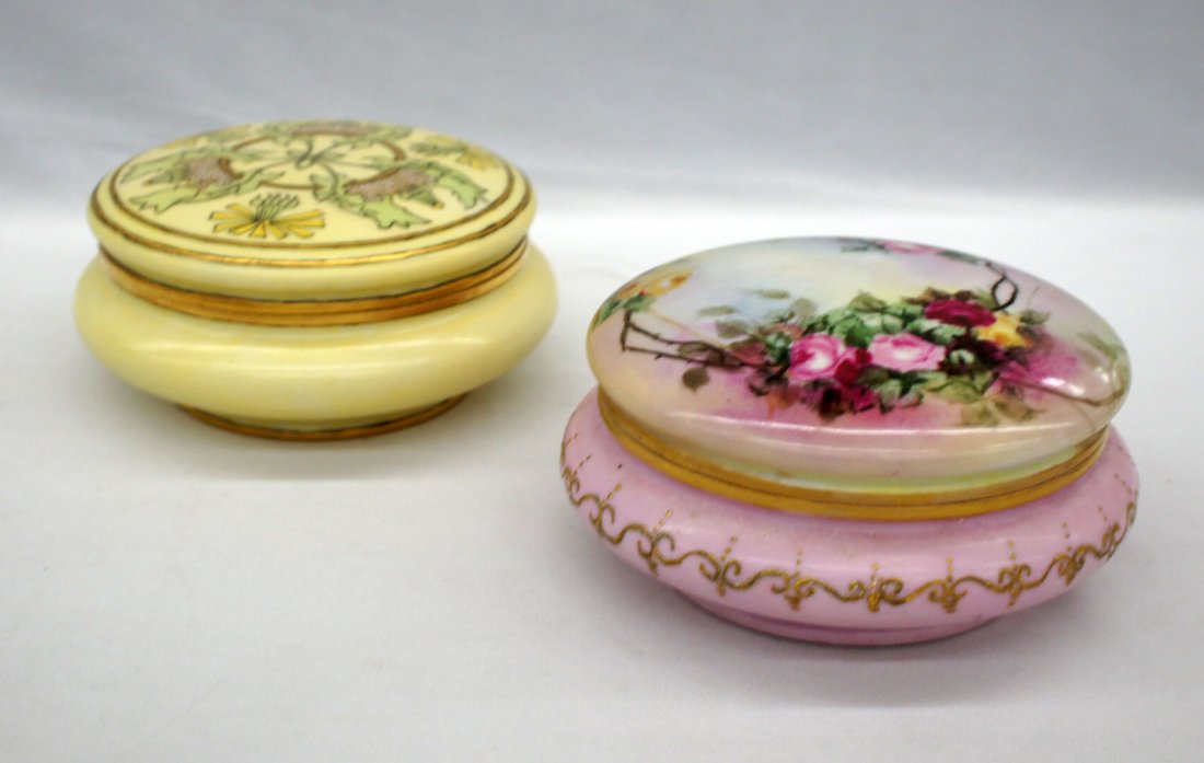 Two Limoges France hand painted dresser or powder: Two Limoges France hand painted dresser or powder boxes. 2.75'' x 6.25'' and 3'' x 6.25''. Both are in excellent condition.