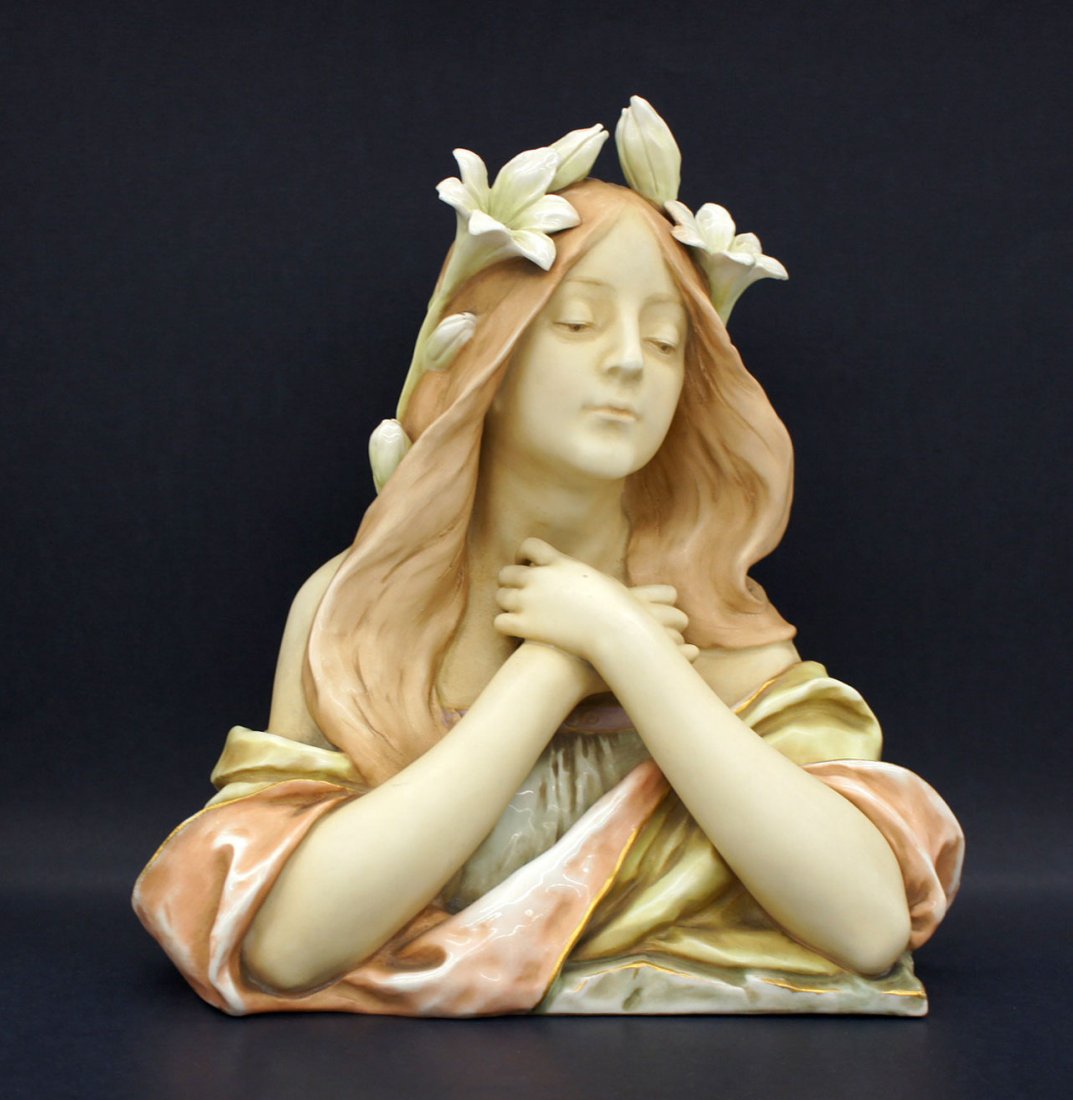 Ernst Wahliss Amphora glazed porcelain bust of lady.: Ernst Wahliss Amphora glazed porcelain bust of lady. Marked Made in Austria, E.W. Turn Wien, blue depose stamp. Very good condition with some small chips to the flower pedals.