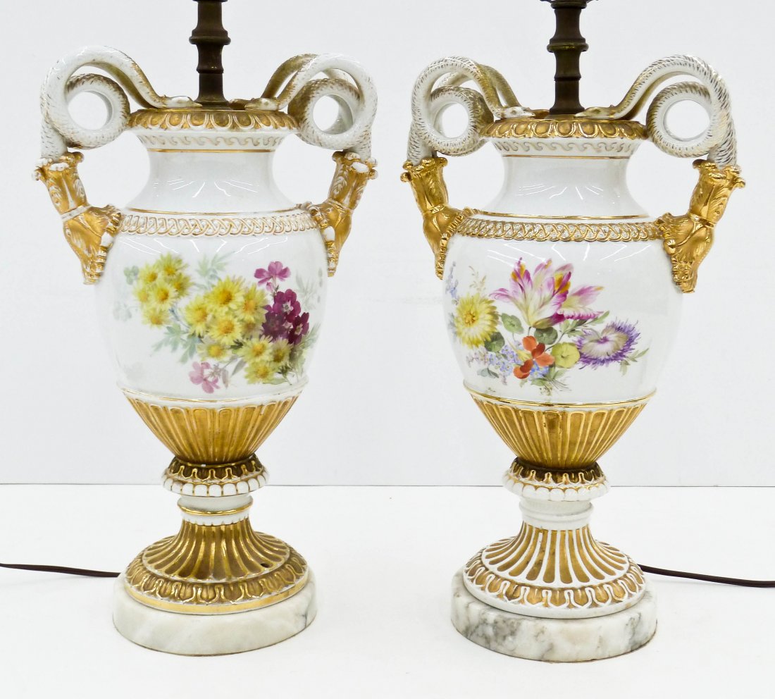 Pair Antique Sevres Style Porcelain Urn Table Lamps: Pair Antique Sevres Style Porcelain Urn Table Lamps 30.5''x9.5'' Each. Figural gilt snake handles with polychrome enameled floral motifs. Base on marble pedestal is 16'' tall.