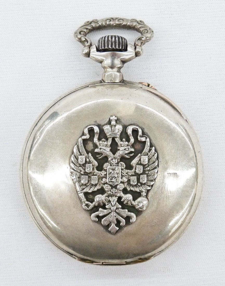 Antique Russian Presentation Coin Silver Pocket Watch: Antique Russian Presentation Coin Silver Pocket Watch 50mm. Imperial Russian double eagle emblem on case. French made marked, ''ANCAE LIGNE DADITE SPIRAL BAEGUET Balancier Coupe 25 Rubis REMONTOIR Gen