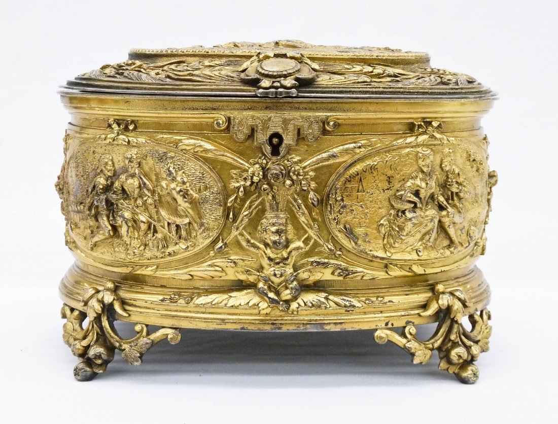 Antique French Gilt Silverplated Jewelry Casket: Antique French Gilt Silverplated Jewelry Casket 4.75''x7''x5''. Relief courting scene panel on lid with four similar panels around sides. Figural fruit feet. Signed illegibly on bottom. Overall wear t