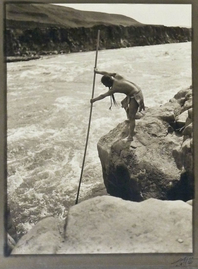 Edward S. Curtis (1868-1952 Washington) ''The: Edward S. Curtis (1868-1952 Washington) ''The Fisherman'' Platinum Border Print Photograph 7.5''x5.5'' Image. Housed in original simple wood frame with title label on verso. Signed ''Curtis L.A.'' in
