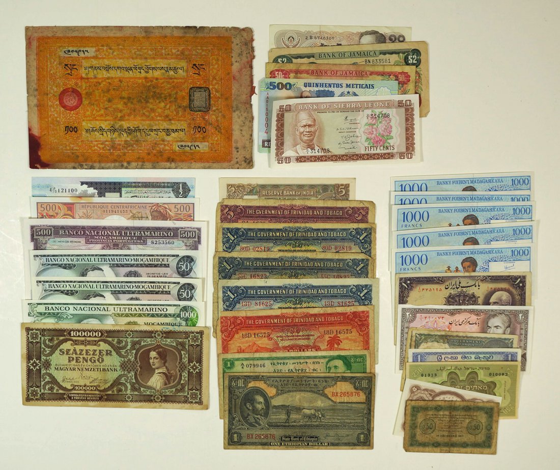 Group of (32) pieces of vintage and antique currency: Group of (32) pieces of vintage and antique currency from countries of Caribbean, Middle East and Africa
