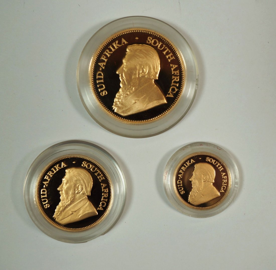 2001 South Africa Fractional Gold Krugerrand Proof Set.: 2001 South Africa Fractional Gold Krugerrand Proof Set. Includes 1/2 oz. 22k coin, 1/4 oz. 22k coin, and 1/10 oz. 22k coin. In fitted box with COA.