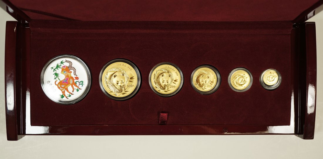 2003 China Panda Gold and Lunar Premium Set. The gold: 2003 China Panda Gold and Lunar Premium Set. The gold coins weights are 1 oz., 1/2 oz., 1/4 oz., 1/10 oz. and 1/20 oz. Total weight 1.85 oz. Limited to 2,000 sets. In fitted box and comes with COA.