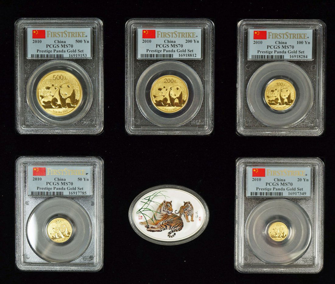 2010 China Gold Panda Prestige Set, First Strike PCGS: 2010 China Gold Panda Prestige Set, First Strike PCGS MS70. Approx. 1.9 oz. of 24k gold. In fitted box and comes with COA.