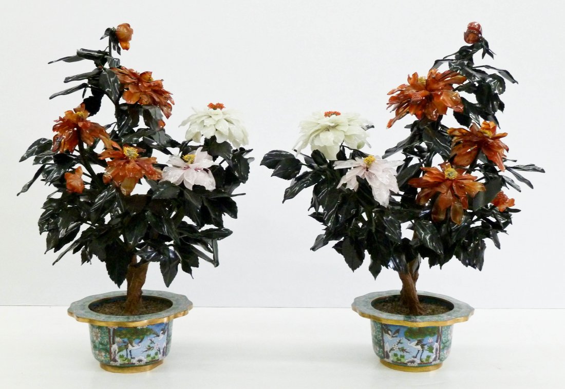 Pair of Fine Chinese Jade Trees in Cloisonne Planters: Pair of Fine Chinese Jade Trees in Cloisonne Planters 29''x20'' Each Approximately. Carved nephrite jade, carnelian agate, and rose quartz leaves with blossoming flowers. Each sits in a cloisonne scal