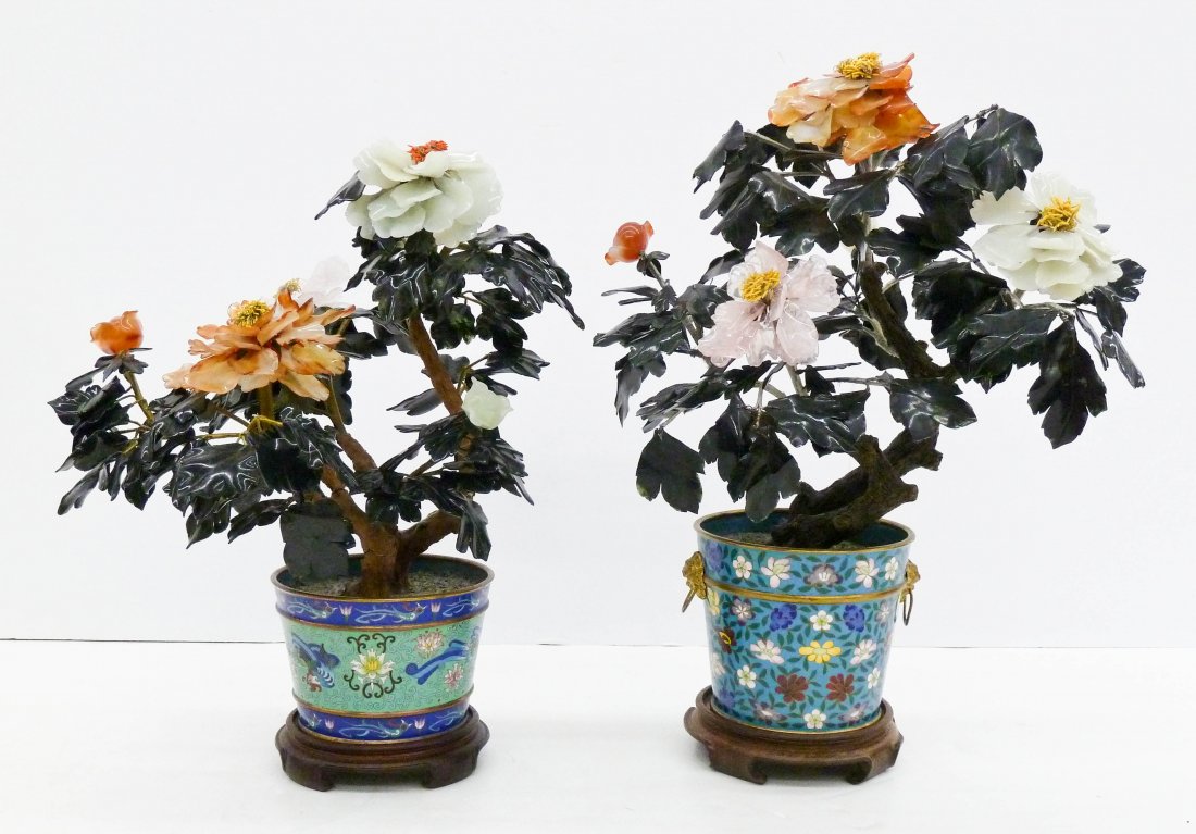 2pc Chinese Fine Jade Trees in Cloisonne Planters. Both: 2pc Chinese Fine Jade Trees in Cloisonne Planters. Both have carved nephrite jade, carnelian agate, and rose quartz leaves with blossoming flowers. Taller piece measures 22''x17'' with rosewood stand 