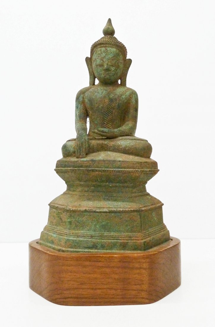 Antique Burmese Bronze Seated Buddha on Wood Base: Antique Burmese Bronze Seated Buddha on Wood Base 12.75''x7''. Verdigris green patina. Southeast Asia, 19th century or older.