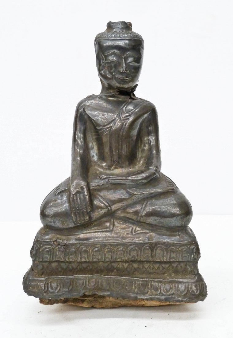 Antique Burmese Silver Over Clay Seated Buddha: Antique Burmese Silver Over Clay Seated Buddha 6''x3.5''. Some breaks in neck region and on top of head. Southeast Asia, 19th century or older.