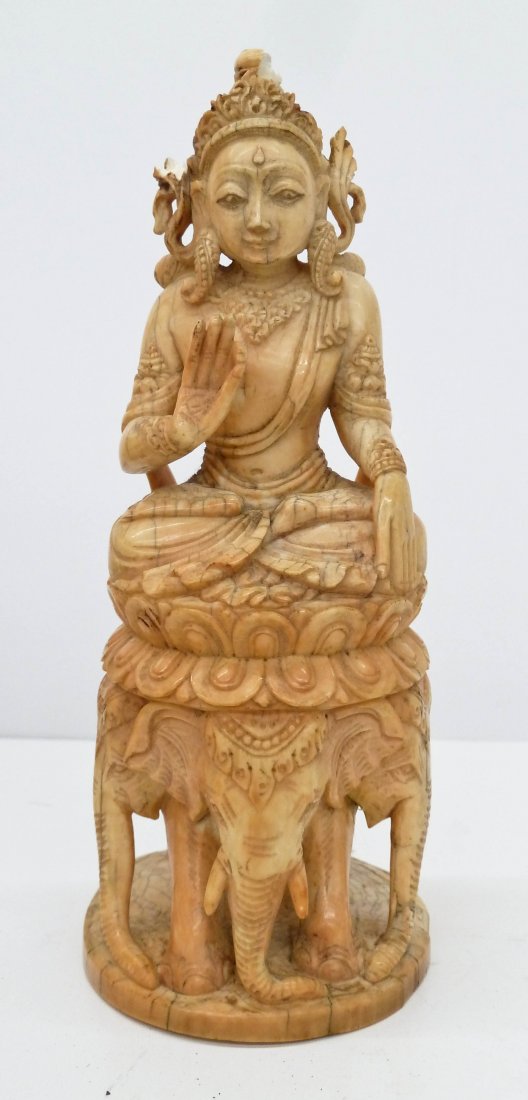 Antique Burmese or Thai Carved Ivory Buddha on Elephant: Antique Burmese or Thai Carved Ivory Buddha on Elephant Throne 6.75''x2.75''. Ornately carved weighing 437 grams. Some chipping to head ornament and base. Southeast Asia, 19th century or older.