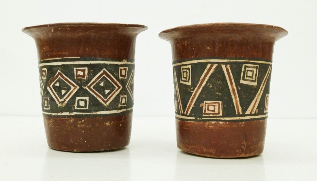 Pair of Inca Ceramic Kero Vessels 3''x3.25'' Each: Pair of Inca Ceramic Kero Vessels 3''x3.25'' Each Approximately. Pre Columbian pots with geometric painted motif around exterior. Excellent condition. Peru, 1400 to 1500 CE.