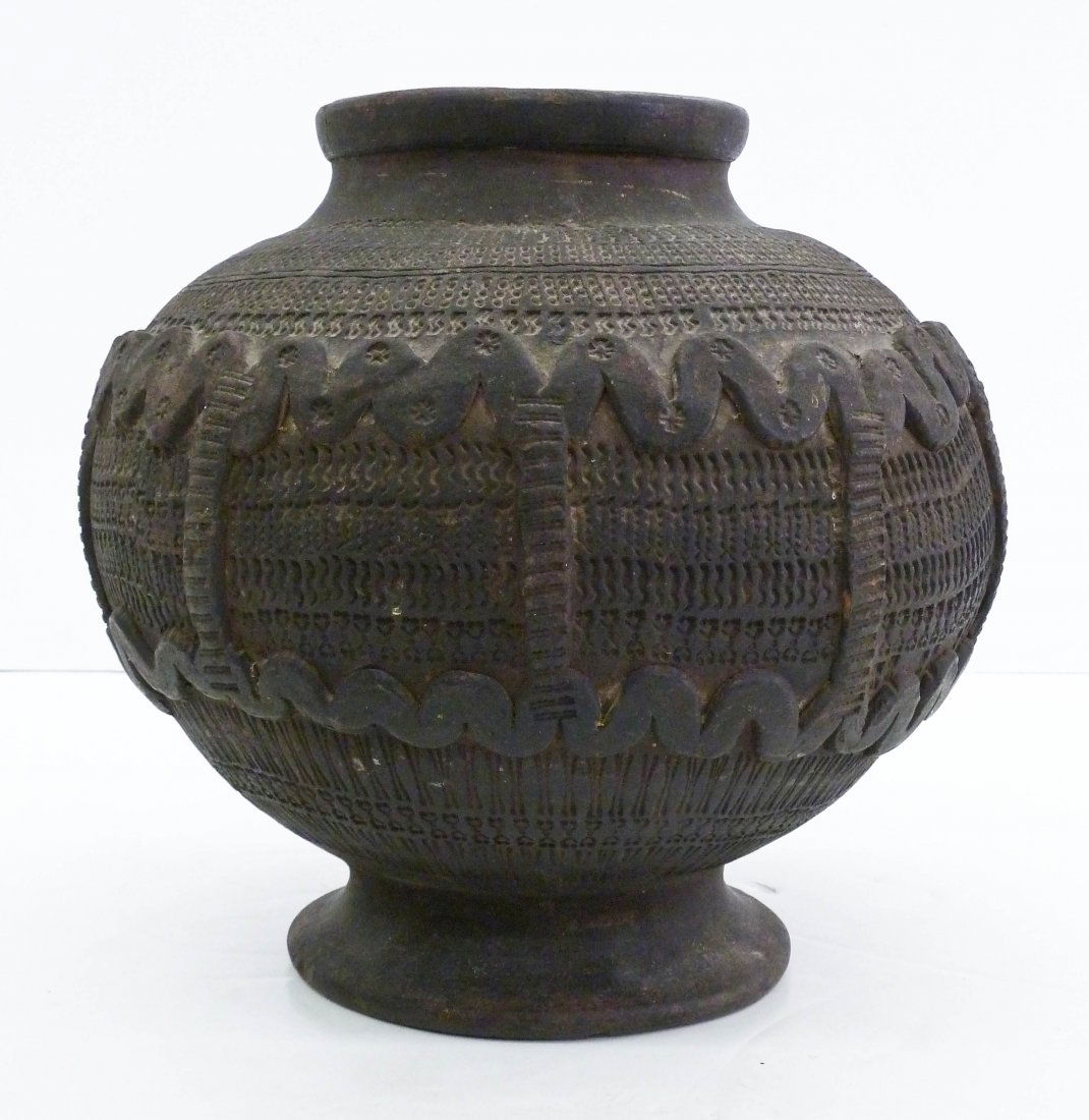Antique Kalinga Philippines Rice Storage Jar 12''x12''.: Antique Kalinga Philippines Rice Storage Jar 12''x12''. Earthenware jar has applied coil work with impressed geometric designs around exterior. Philippine ceramic. Some slight bottom edge chips.